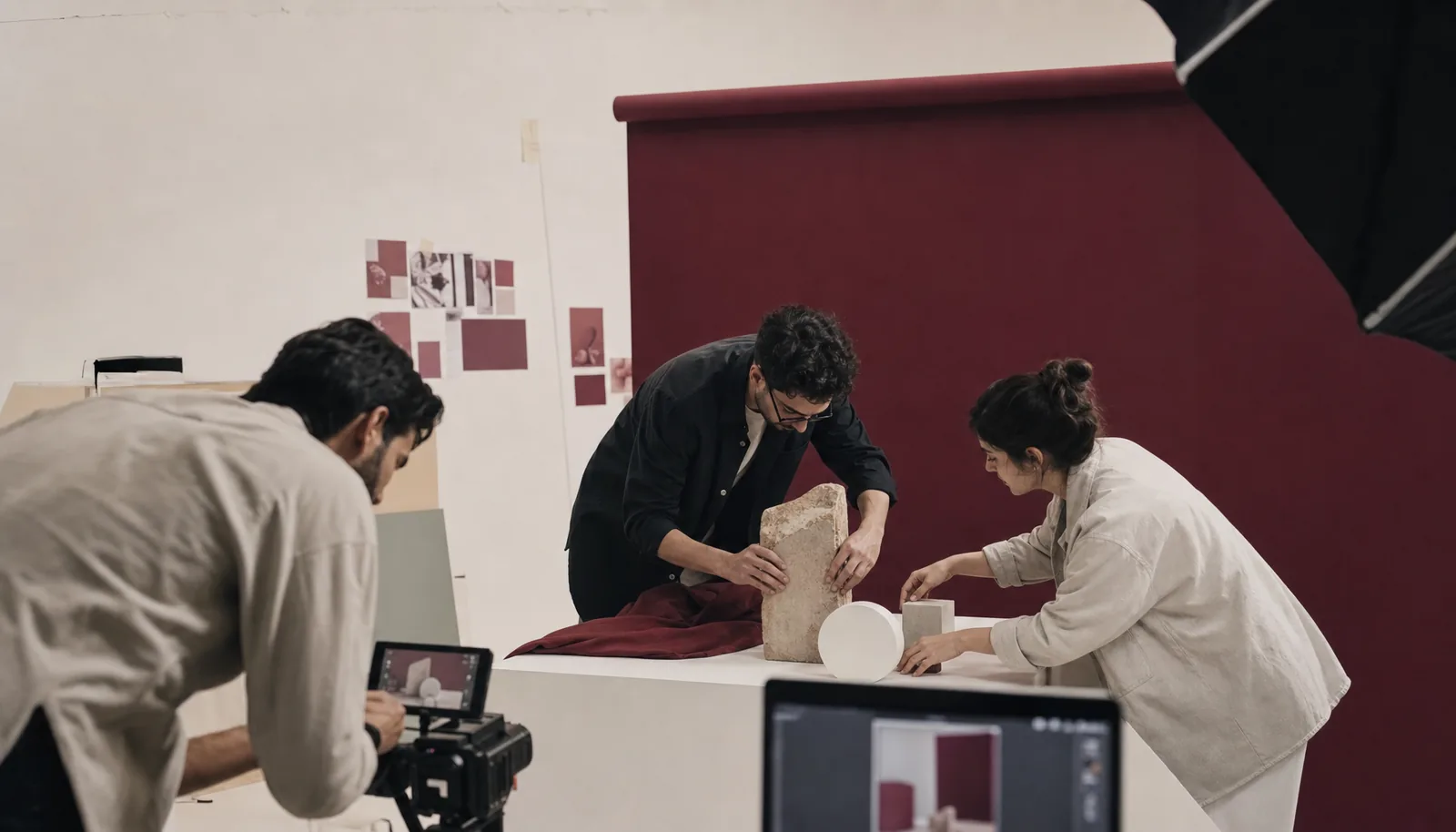 An in-house production team preparing a campaign shoot